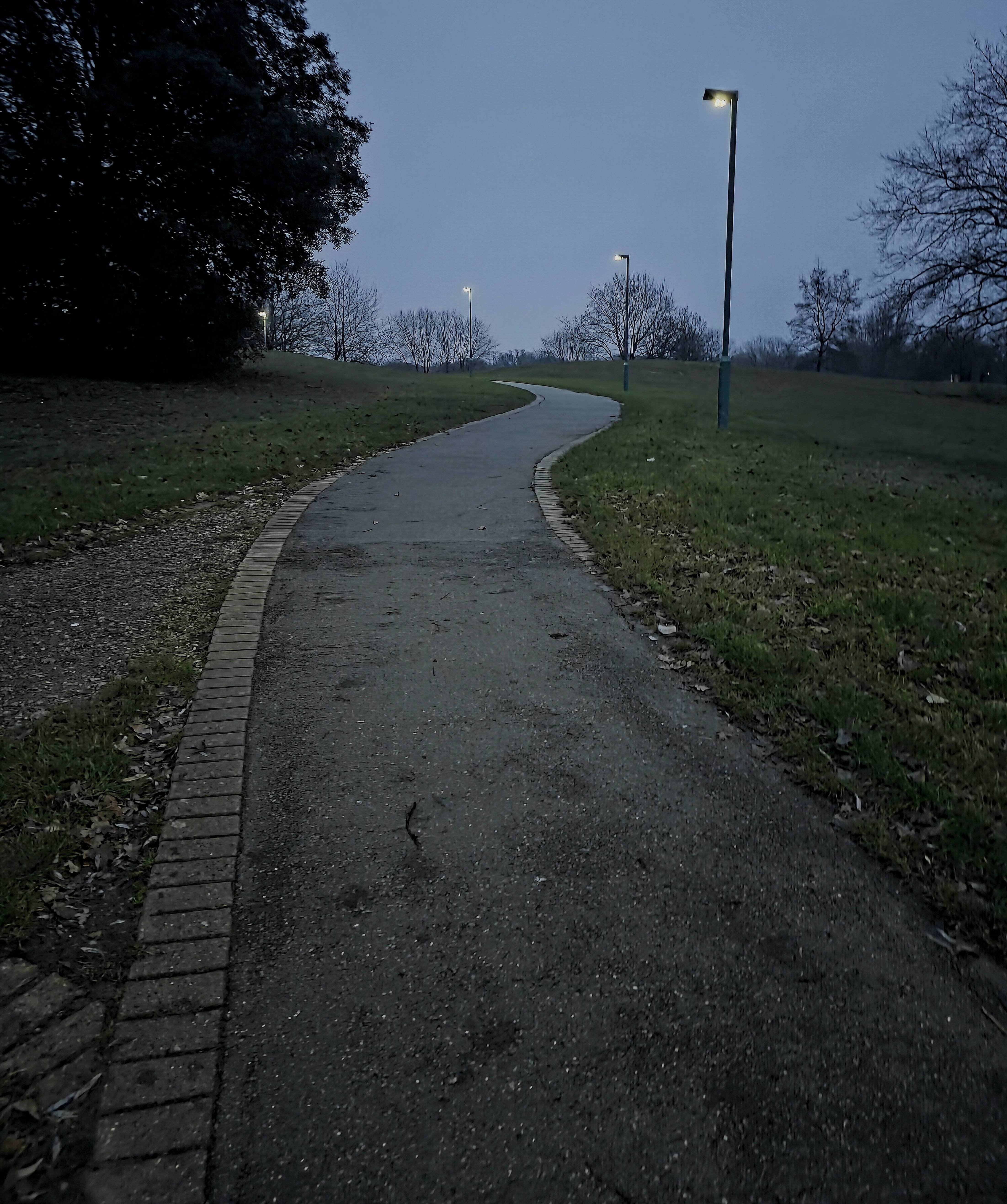 A photo of long, winding path travailing uphill asking what are your challenges for 2026. Photo take by Baldi, A.K.A Amonn AL-Mahrouq