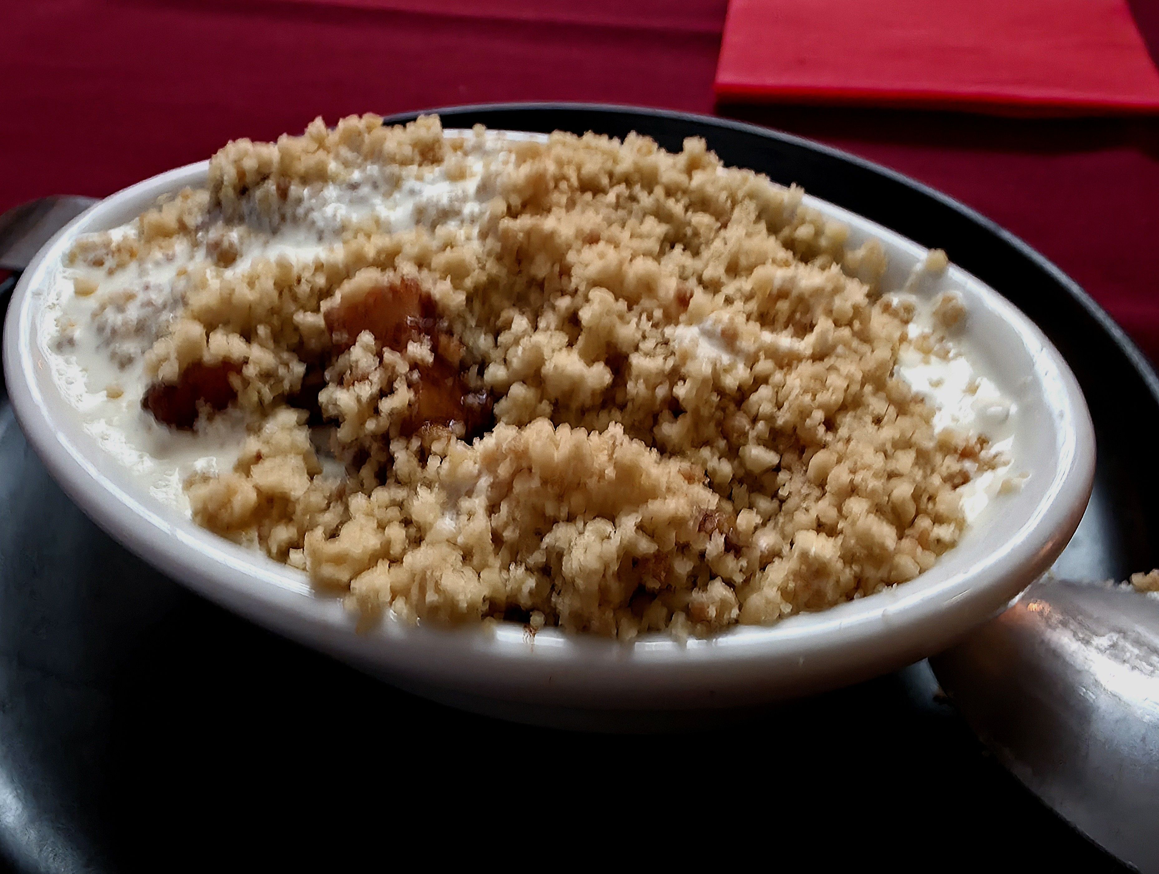 Photo of the 2025 edition of Chambers, Southsea Xmas Lunch Apple Crumble Desert Dish. Photo taken by Baldi, A.K.A Amonn AL-Mahrouq Home on the Web: All Wired Up in November 2025.