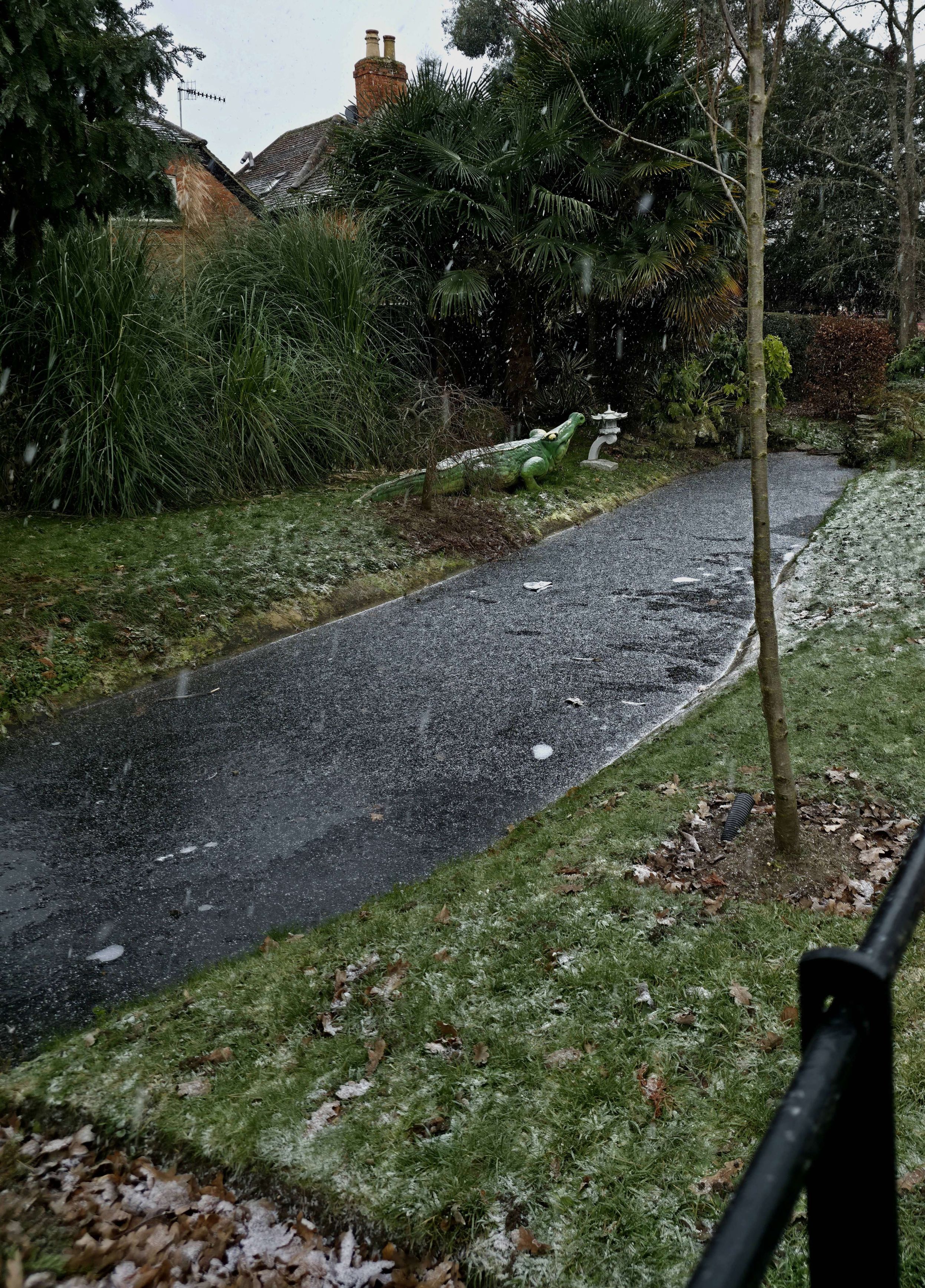 A photo taken by Baldi, A.K.A Amonn AL-Mahrouq of the other direction of the same stream in Stoke Park Gardens, Guildford, Surrey, United Kingdom where snow was falling in January 2026.