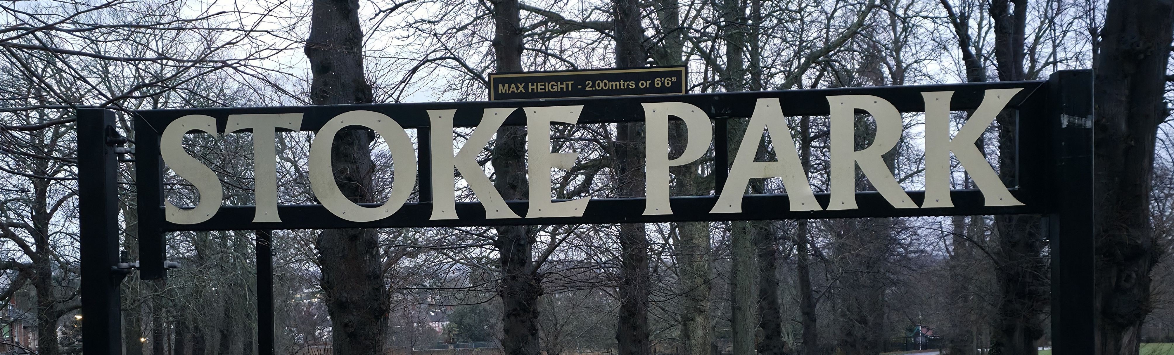 A photo taken by Baldi, A.K.A Amonn AL-Mahrouq of an entrance sign into Stoke Park, Guildford.