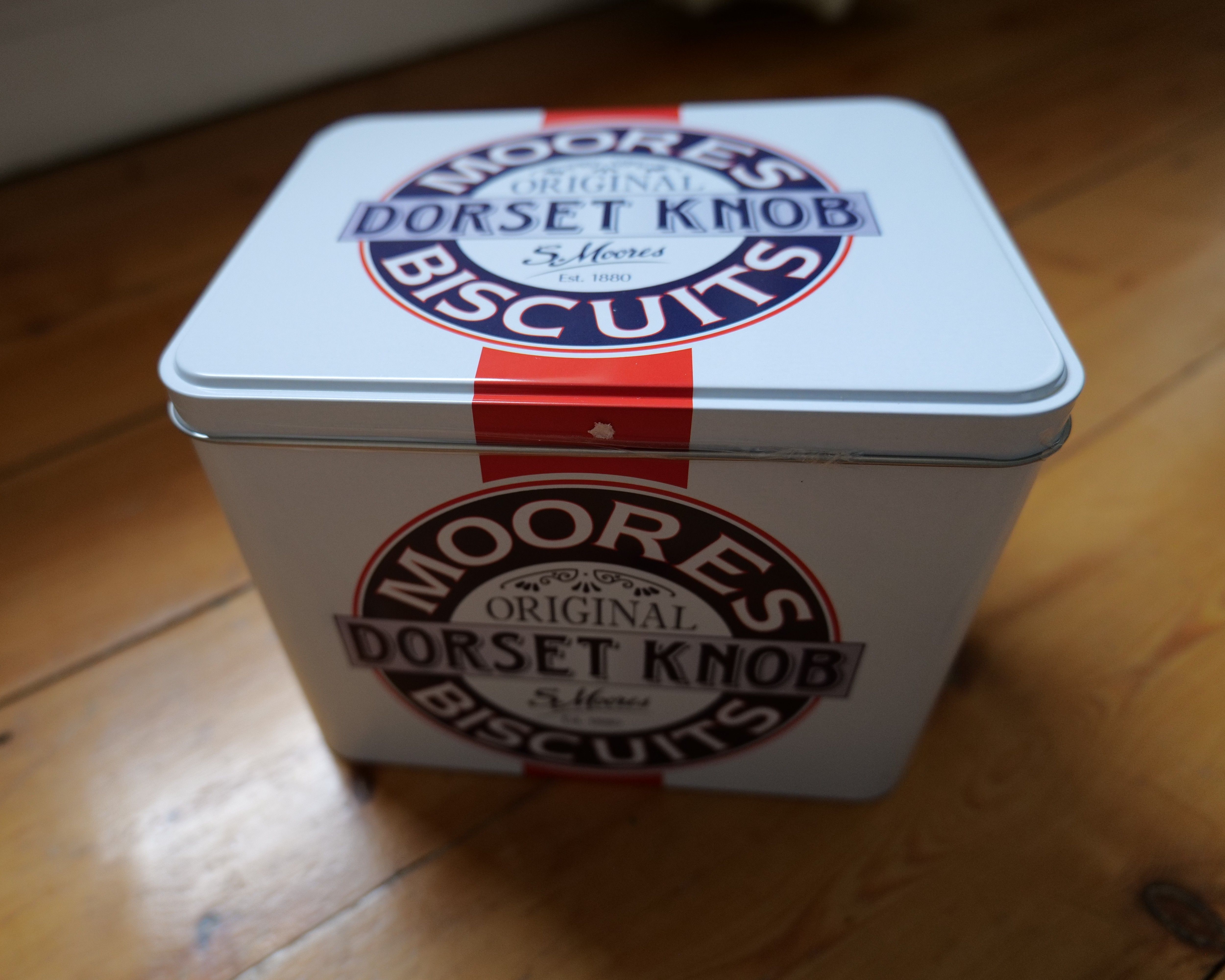 A photo of a tin of Christmas Dorset Biscuits given to Baldi. Photo taken by Baldi, A.K.A Amonn AL-Mahrouq in January 2026.